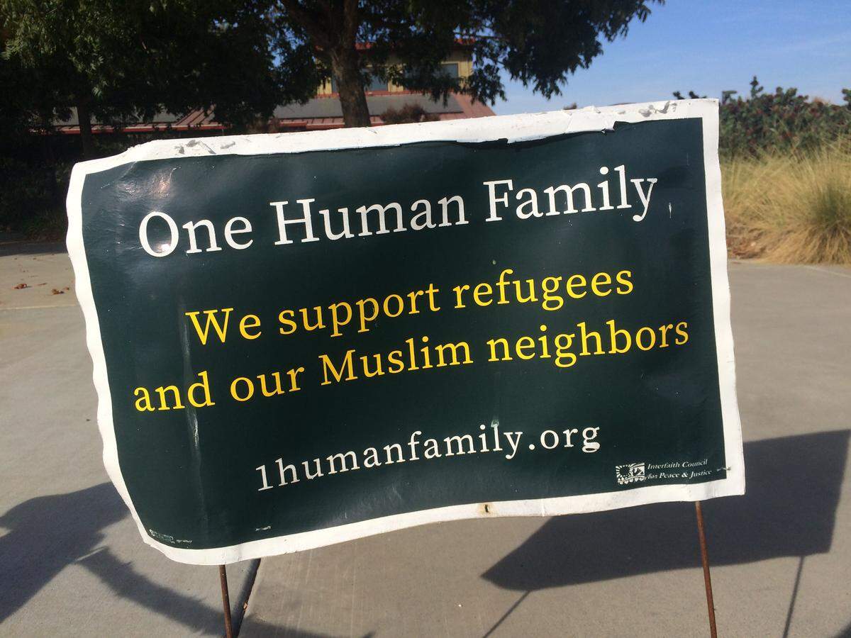 The Unitarian Universalist Church of Fresno said it was also asked to move this sign, welcoming refugee and Muslim neighbors, during the June primary election.