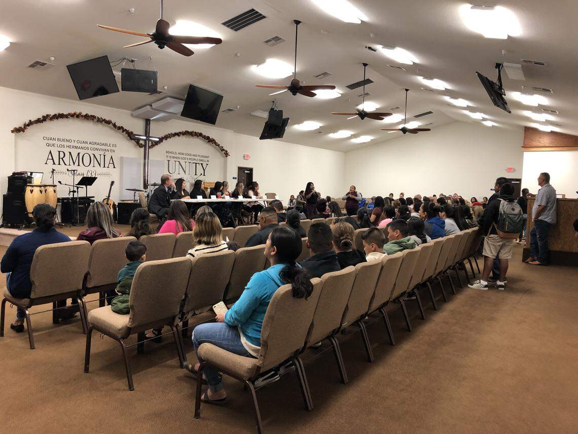 Parents are shown at the Ezequiel Tafoya Alvarado Academy board meeting on Tuesday, Nov. 21, 2019.