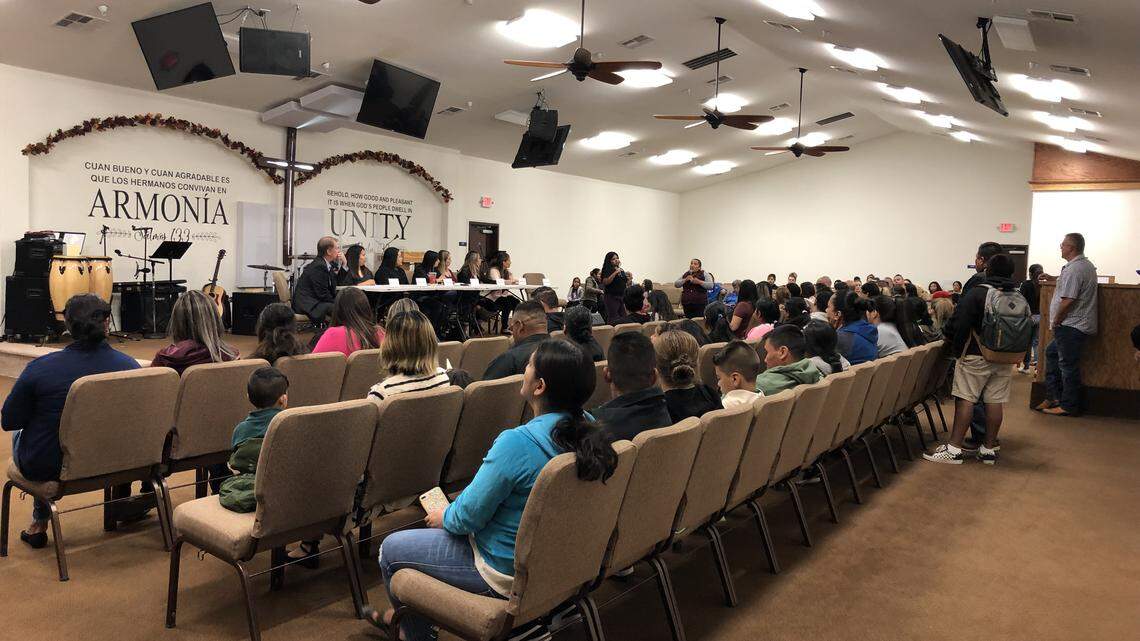 Parents are shown at the Ezequiel Tafoya Alvarado Academy board meeting on Tuesday, Nov. 21, 2019.