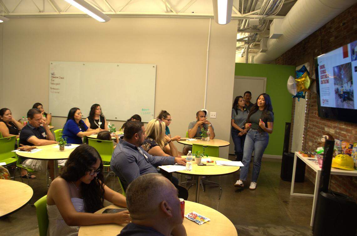 Karina Pano presenting at the June 7th wellness event she organized for families in the construction industry.