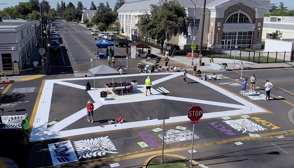 Volunteers and neighbors gathered to create art in front of Fresno High School back in July 2019.
