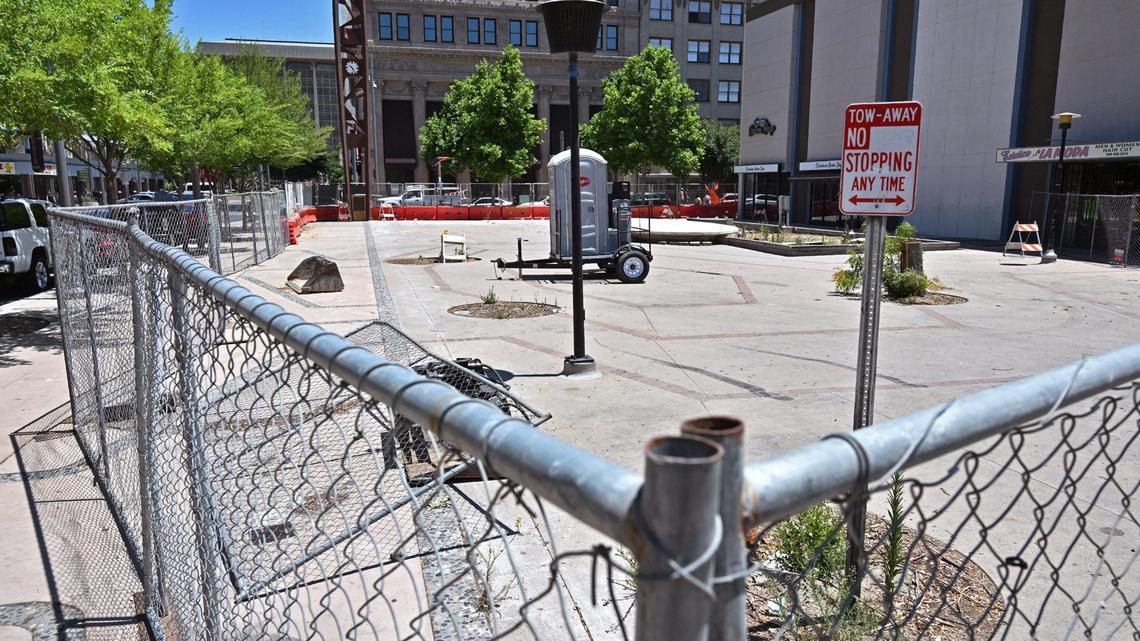 Fencing blocks off the plaza from access at Mariposa and Fulton streets in this downtown Fresno photo taken in June.
