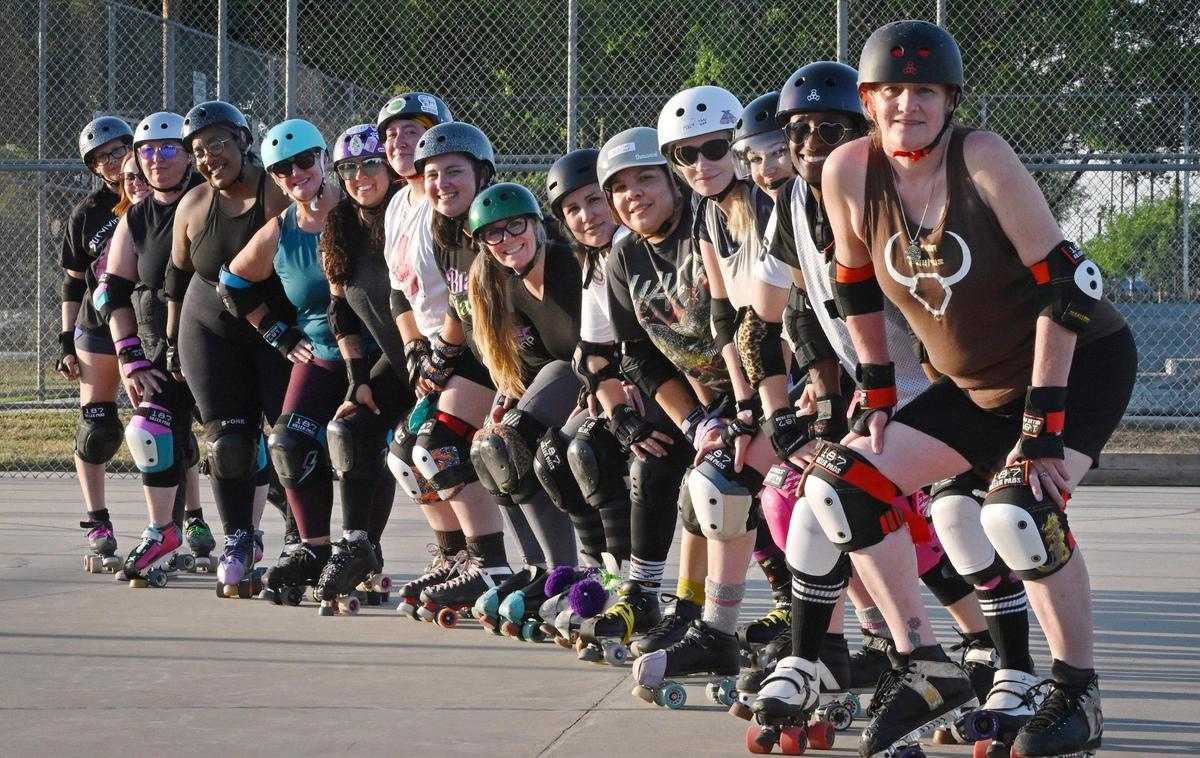 The Ash City Roller Derby team poses at Cary Park on Thursday evening, May 6, 2025, in Fresno.