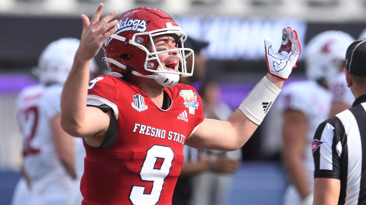 Fresno State quarterback Jake Haener celebrates Zane Pope’s touchdown at the Jimmy Kimmel LA Bowl against Washington State on Saturday, Dec. 17, 2022 in Inglewood, CA.