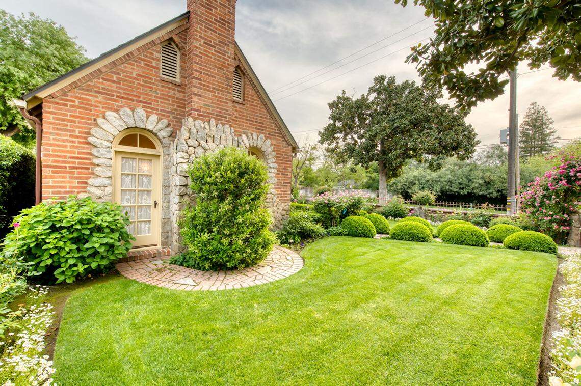 This storybook Tudor cottage at 304 East Simpson Ave. in Fresno features a brick exterior with hand-split river rock trim and details. It’s on the market for $455,000.
