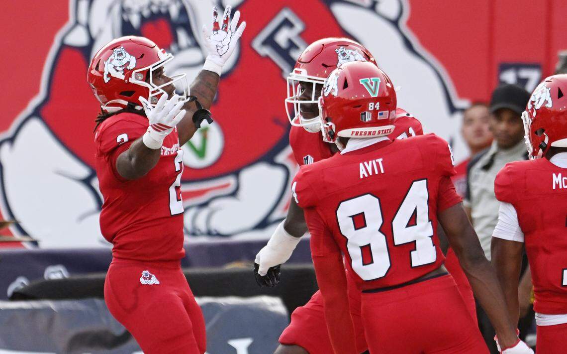 Fresno State's Rayshon Luke, left, celebrates his touchdown against Georgia Southern Saturday, Aug. 30, 2025 in Fresno.