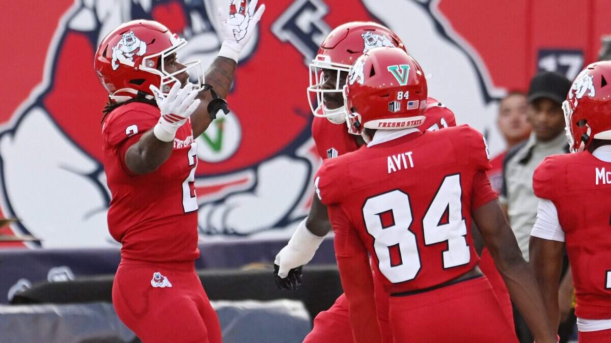 Fresno State's Rayshon Luke, left, celebrates his touchdown against Georgia Southern Saturday, Aug. 30, 2025 in Fresno.