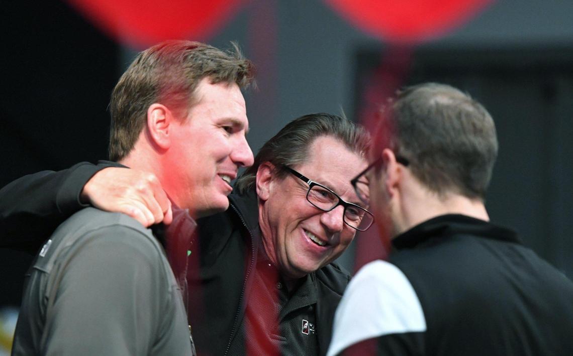 Fresno Christian journalism adviser Greg Stobbe, center, greets well-wishers as he arrives for a surprise party where he was honored with the Columbia Scholastic Press Association’s Charles R. O’Malley Award for excellence in teaching Friday, April 29, 2022 in Fresno. As part of the over 2 hour program, students inspired by Stobbe in the past sent video messages of gratitude and appreciation, displayed on a large screen to about 100 attendees in the Student Ministry Center at Fresno Christian.