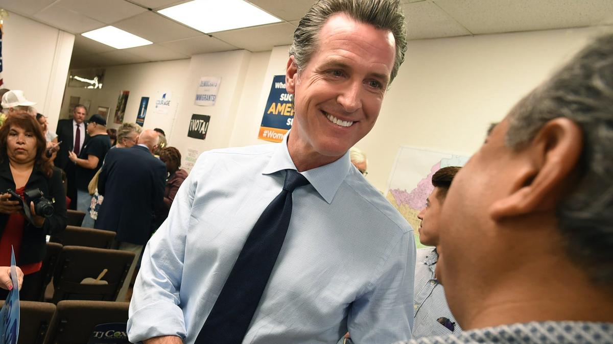 In this file photo, Gov.-elect Gavin Newsom greets a supporter during a campaign stop.