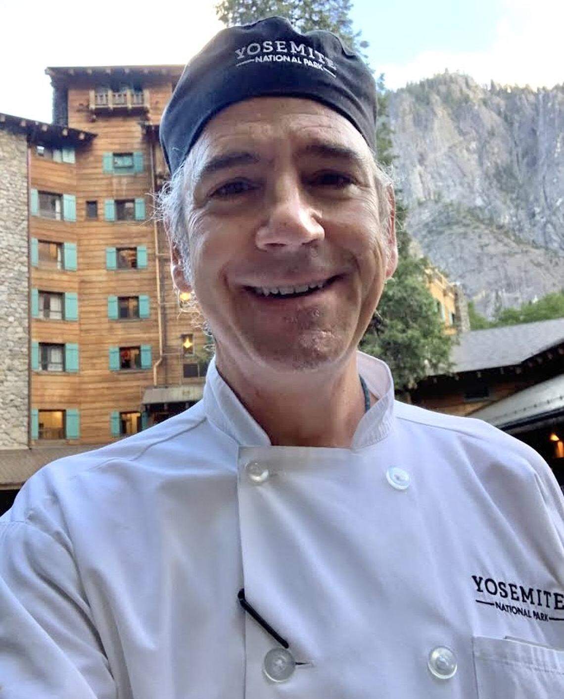 Warren McClain in front of The Ahwahnee in Yosemite National Park, where he works as a cook.