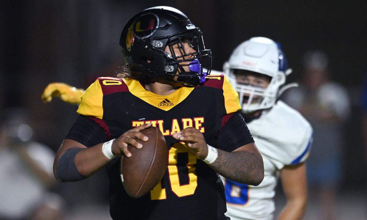 Tulare Union quarterback Jordan Crisp passes against Bakersfield Christian Friday, Sept. 26, 2025 in Tulare. Bakersfield Christian led 10-0 at the half,