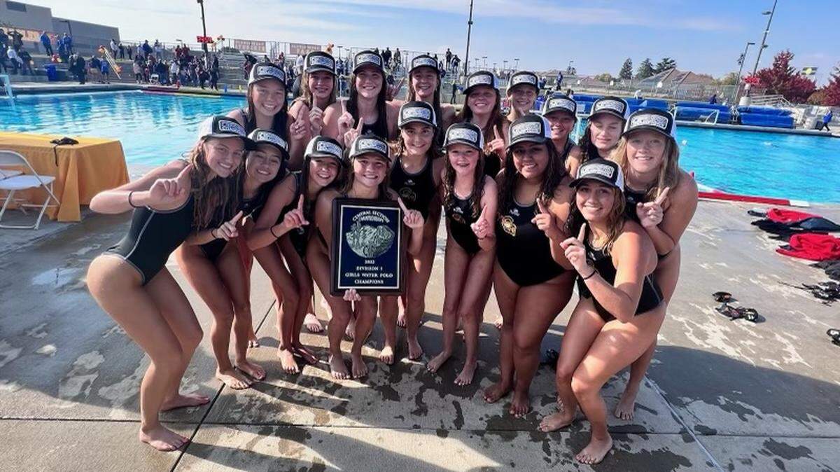 Clovis West poses for a photo after winning the Central Section Division I girls water polo title on Saturday, Nov. 12, 2022.