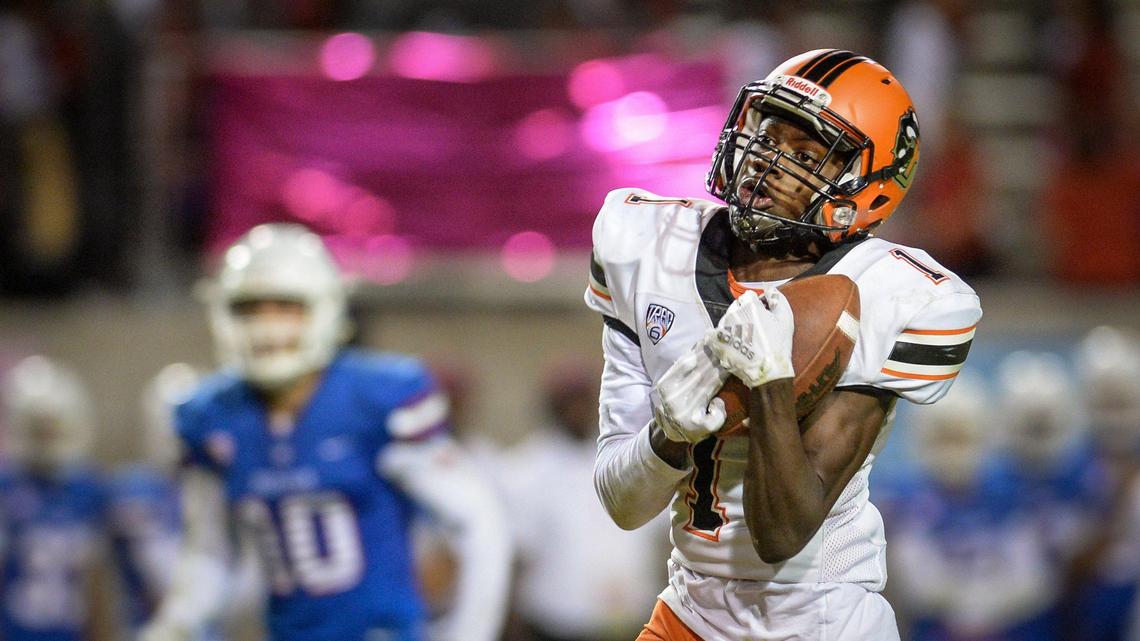 Central’s Xavier Worthy hauls in a long pass before running it into the end zone for a touchdown against Buchanan at Veterans Memorial Stadium in Clovis on Thursday, Oct. 3, 2019.