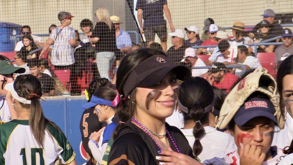 The County’s Marissa Vasquez of Selma smiles before the City/County All-Star high school softball game on Wednesday, June 21, 2023.