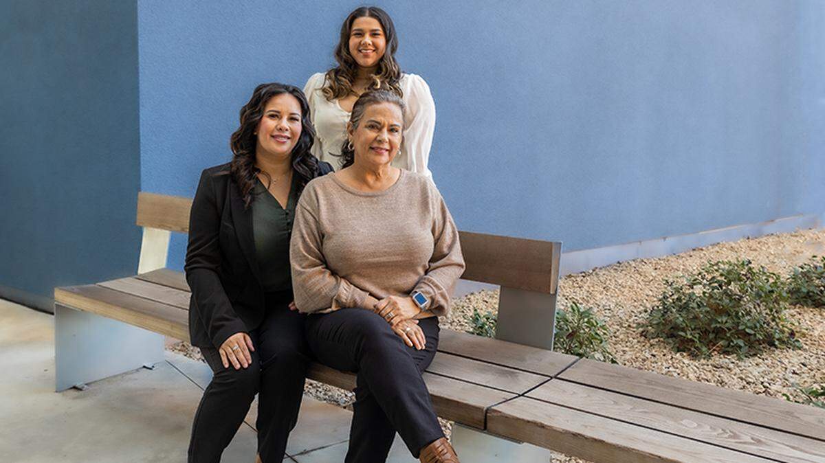 Sharee Sok, left, Korynn Maravilla, top center, and Diana Maravilla make up three generations on UC Merced’s staff.