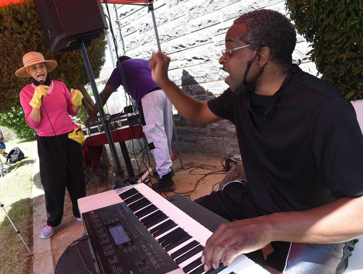 Omie Corrmier, left, and Doni Murray, right, perform a gospel song during Resurrection Day Celebration held by The Free AME Ministries, on Saturday, April 3, 2021, in Fresno.