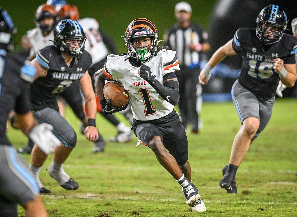 Central East's Ej Morgan finds room against Clovis North defense during their TRAC opener at Veterans Memorial Stadium in Clovis on Thursday, October. 2, 2025.