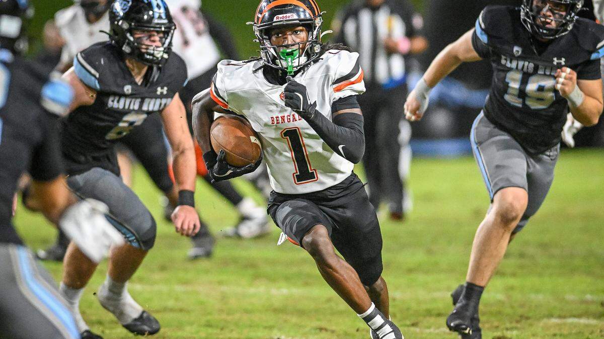 Central East's Ej Morgan finds room against Clovis North defense during their TRAC opener at Veterans Memorial Stadium in Clovis on Thursday, October. 2, 2025.