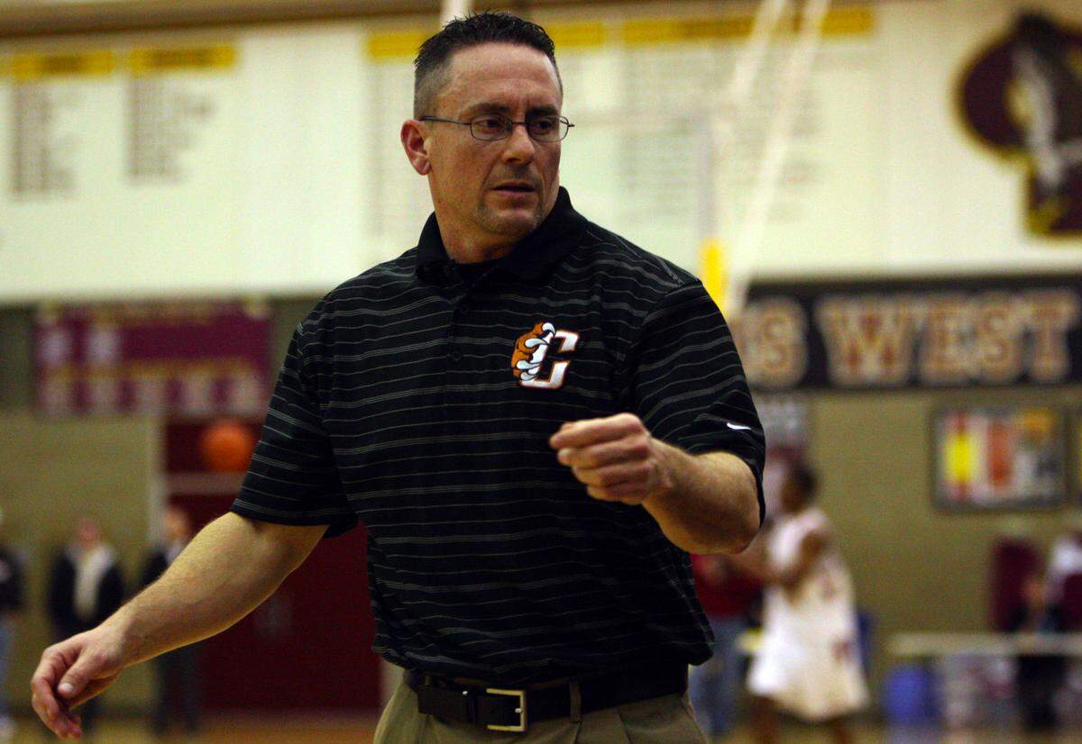 Loren LeBeau, seen coaching Central High School in a game against Clovis West in 2010, has been hired as the head girls basketball coach for Immanuel School in Reedley.