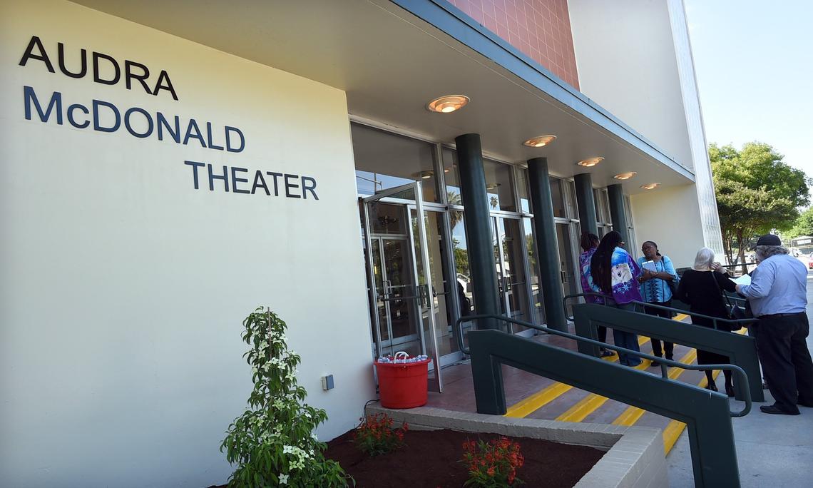 People gather early for the dedication ceremony for the naming of Roosevelt High theater for alumni and Broadway star Audra McDonald, Saturday morning, May 26, 2018.