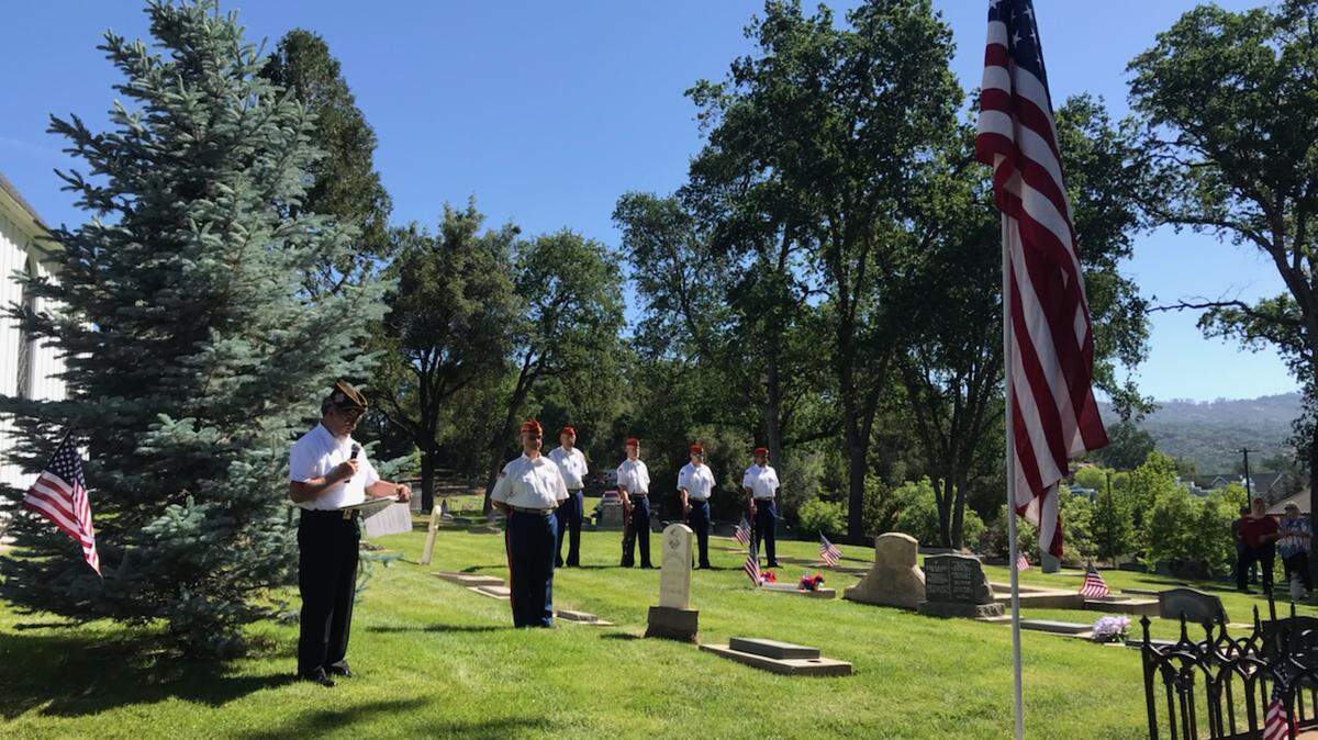 The Marne Corps League Griswold Mountain Detachment leads a Memorial Day ceremony at Oakhill Cemetery in Oakhurst on Monday, May 31, 2021.