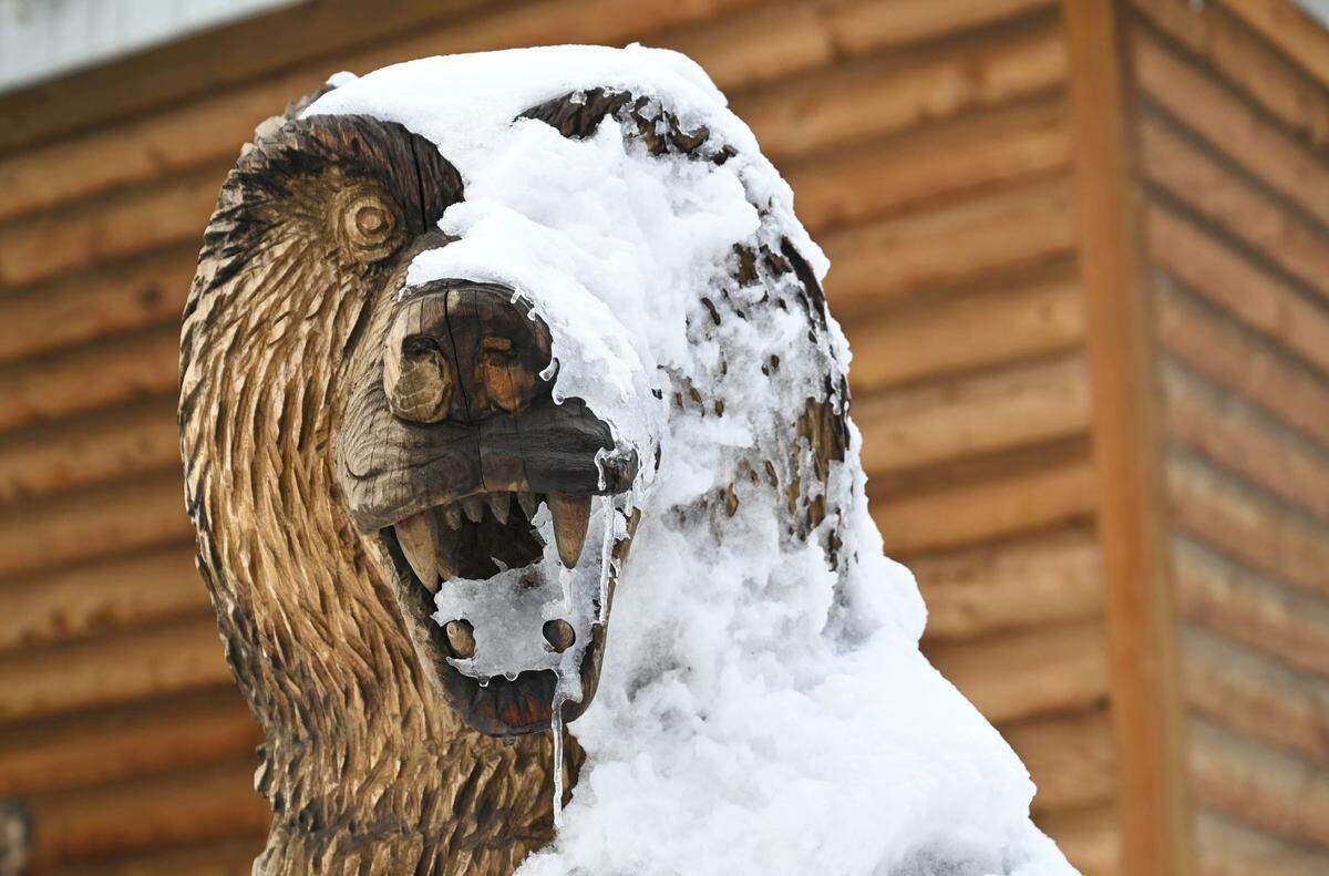 A frosted bear sculpture stands outside a Shaver Lake business Monday, Dec. 12, 2022.
