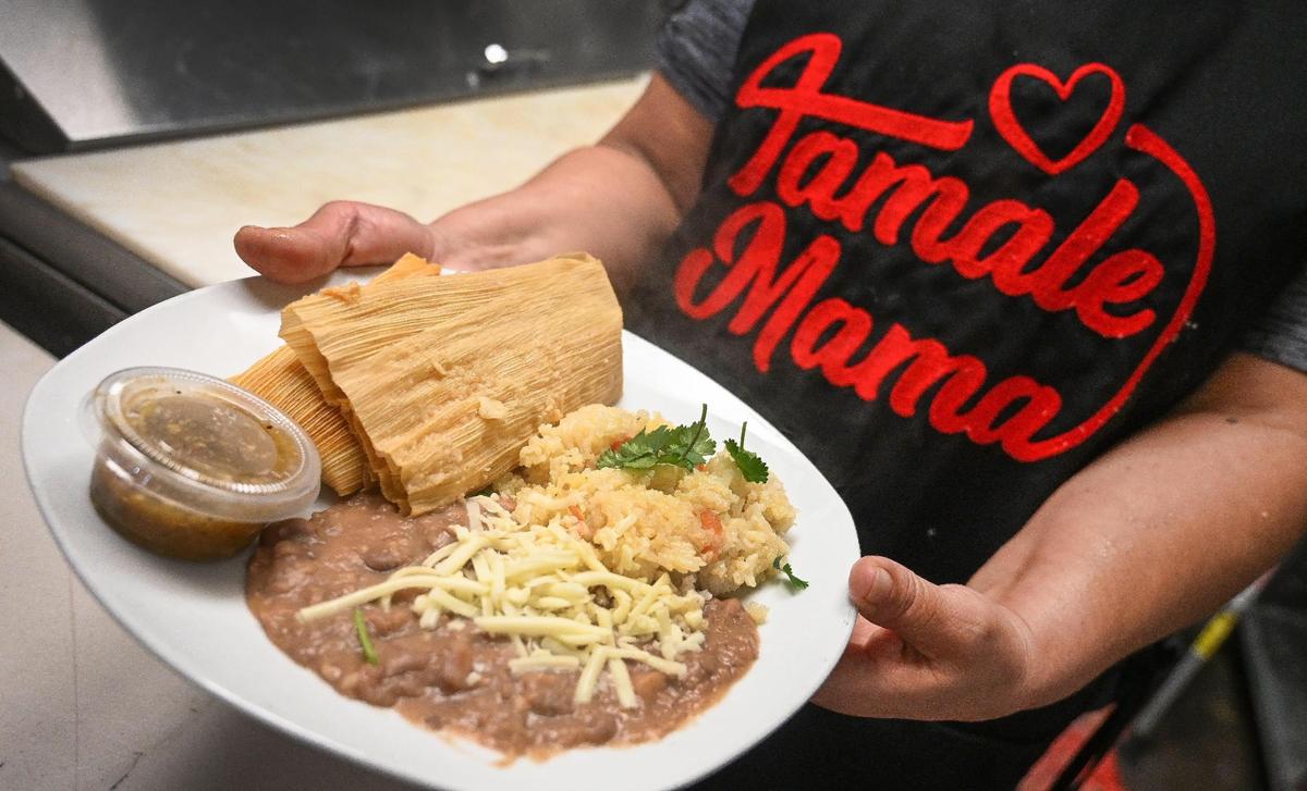 A combo plate of tamales, rice and beans is presented at Tamale Mama, a new restaurant that opened in Fresno’s Chinatown area after TikTok popularity prompted Cristina Leon to follow her dream, on Wednesday, March 1, 2023.