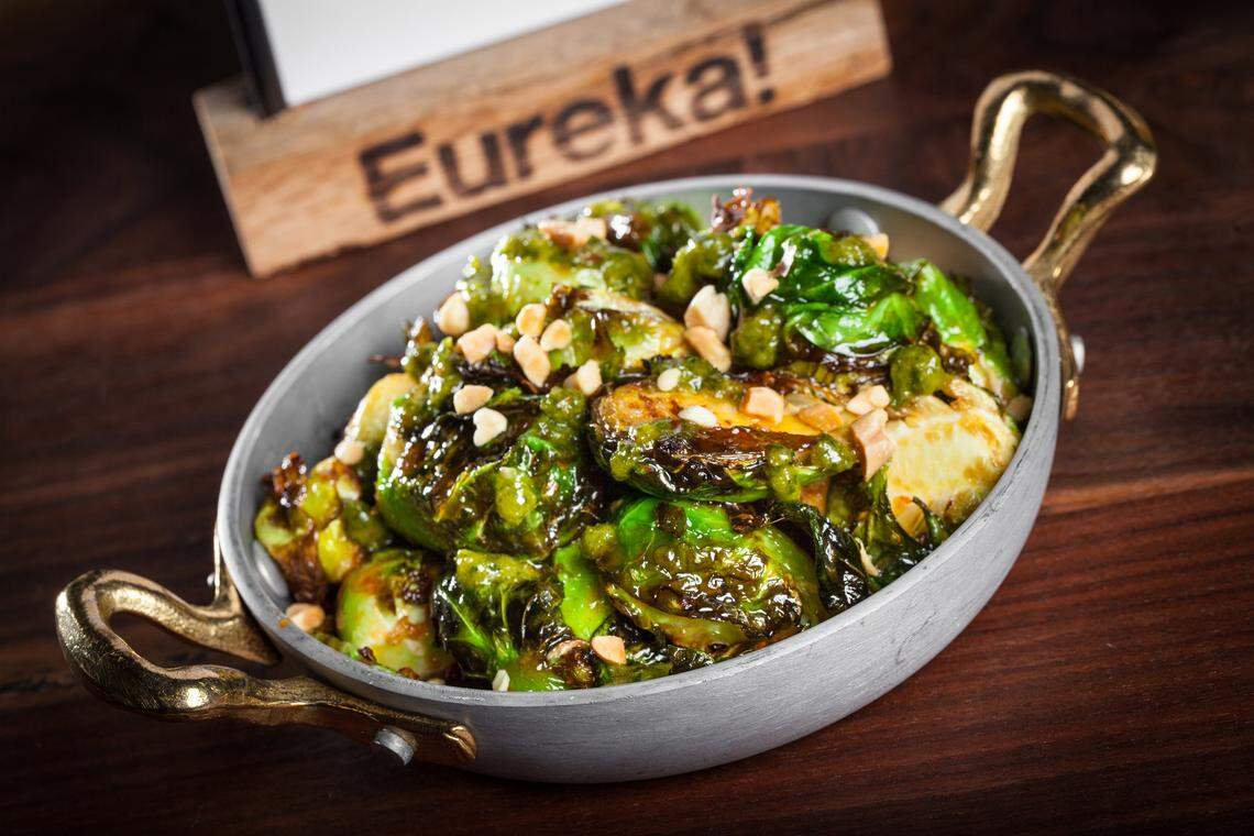 Eureka! restaurant serves Brussels sprouts with an orange-chile glaze and a blend of a herbs.