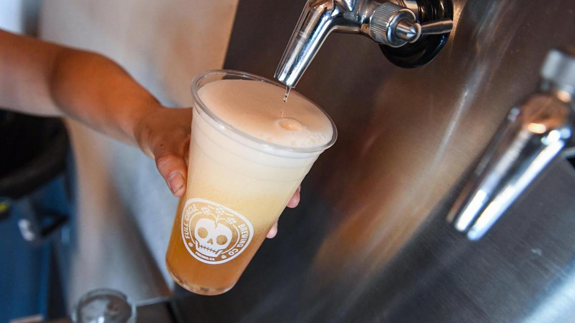 A beer is tapped off at Full Circle Brewing in their new spot at Fulton and Mono streets in downtown Fresno where it will have a grand opening event on Friday and Saturday, May 7 and 8, 2021.