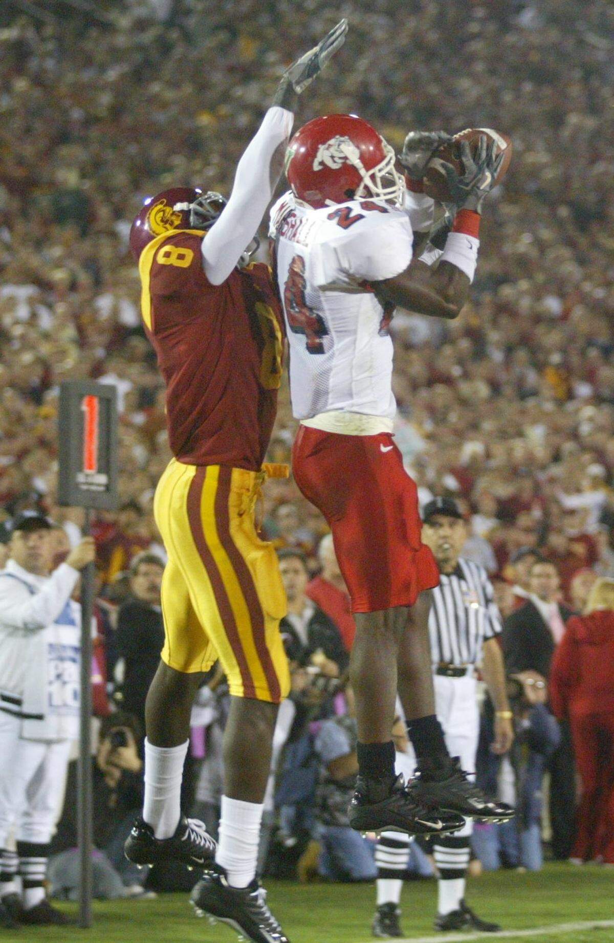 Fresno State's Richard Marshall defends a first down and goal pass to USC's Dwayne Jarrett during the second quarter of their game. The play lead to holding USC to a field goal. 