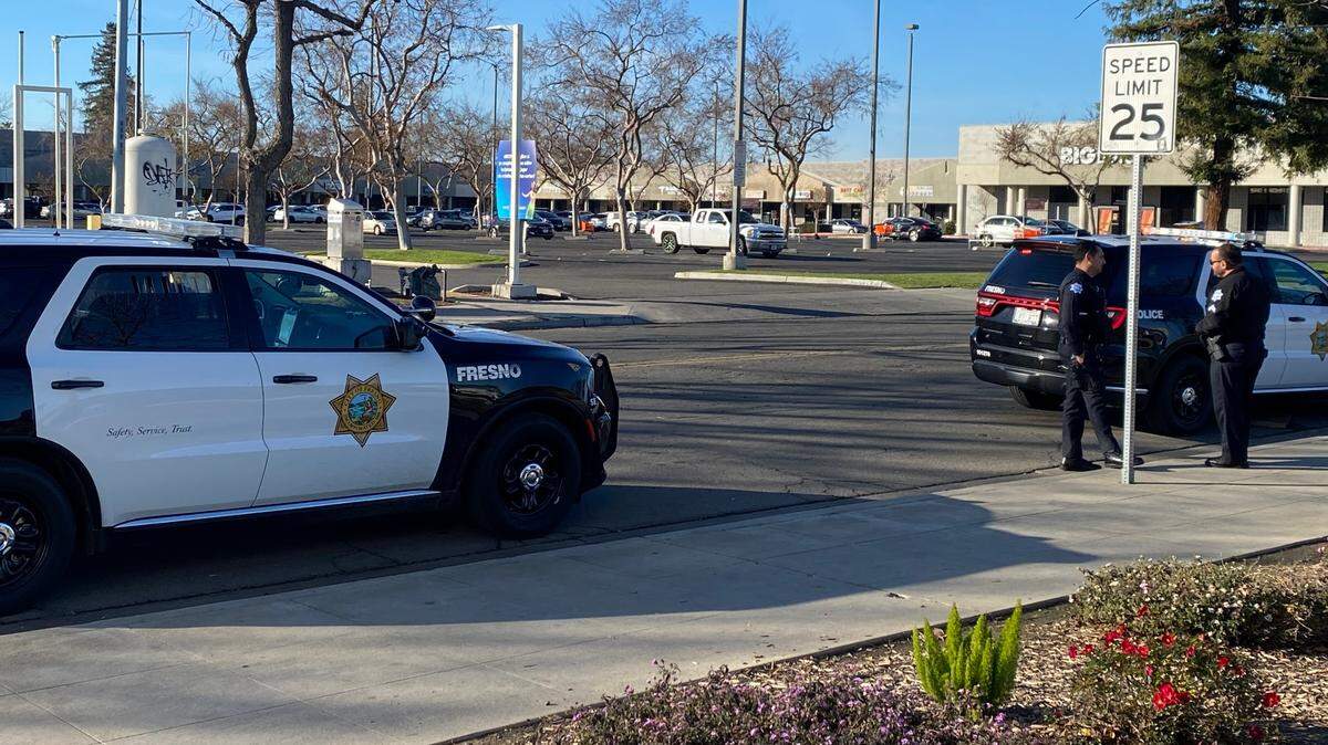 A Fresno police officer ended up in the hospital after trying to transport a suspect to jail, possibly exposed to a substance that caused him to lose consciousness.