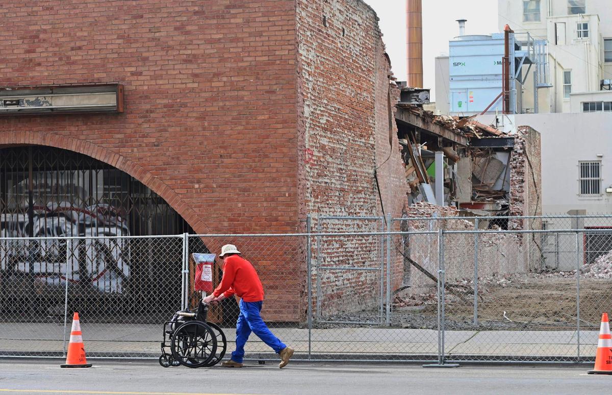Although no activity is to be seen, demolition has begun at the Fink & Skopp building located along Van Ness Avenue near Tulare St., shown Friday, Jan. 19, 2024 in downtown Fresno.