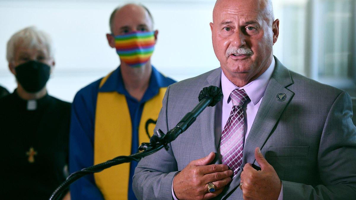 Fresno Mayor Jerry Dyer, right, in a reversal of an earlier decision, announces plans to raise the Pride flag at one of Fresno City Hall’s three flag poles later this month during a press conference Friday afternoon, June 4, 2021 in Fresno.