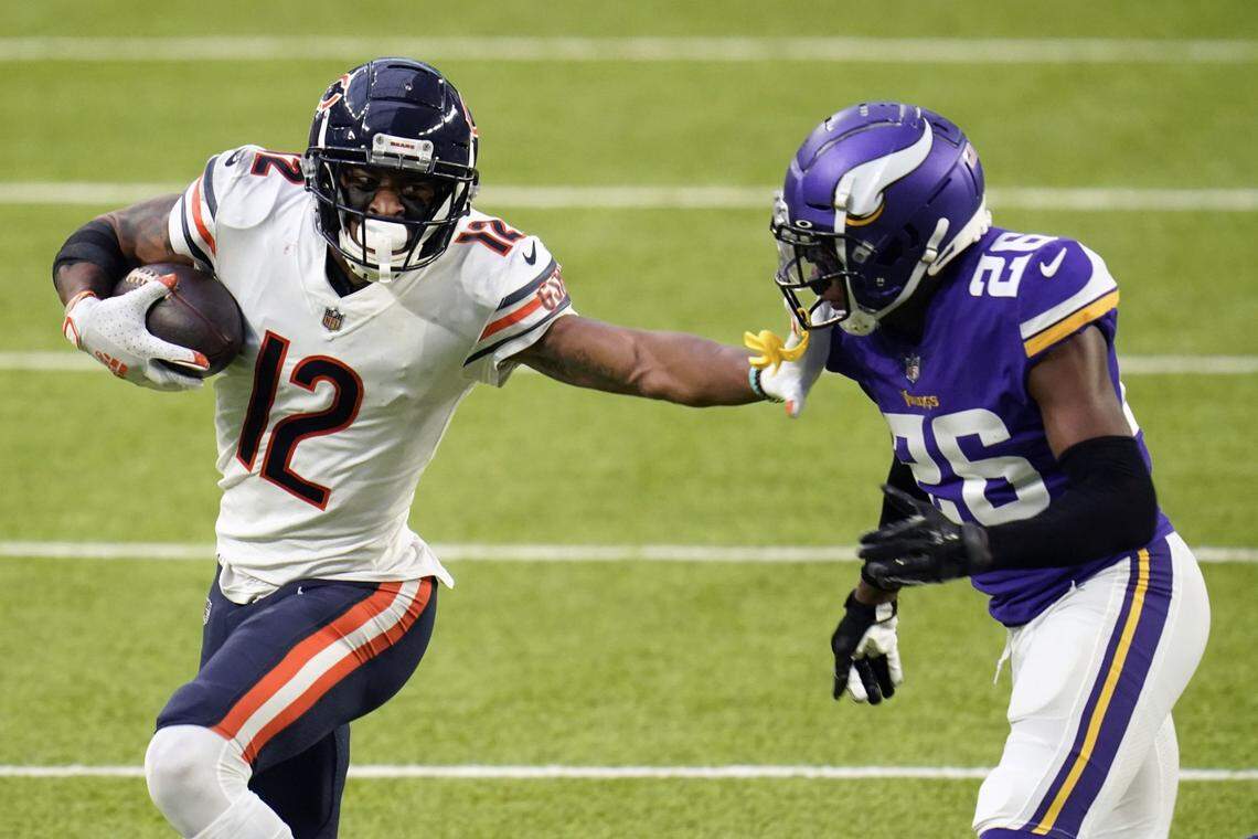 In this Dec. 20, 2020, file photo, Chicago Bears wide receiver Allen Robinson II runs free from Minnesota Vikings cornerback Chris Jones after catching a pass during the second half of a game in Minneapolis.