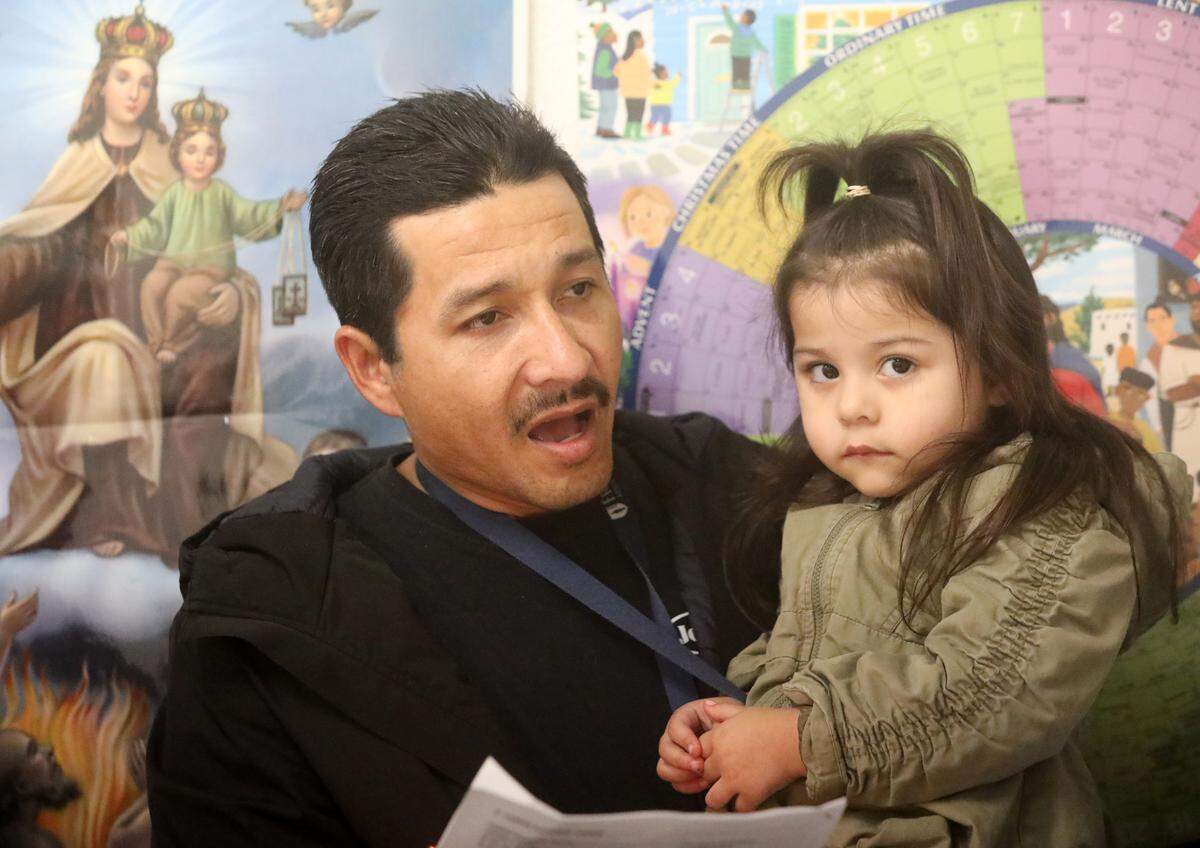 A man sings during the posadas organized at St. Anthony Mary Claret Church in southeast Fresno on Dec. 18, 2023.