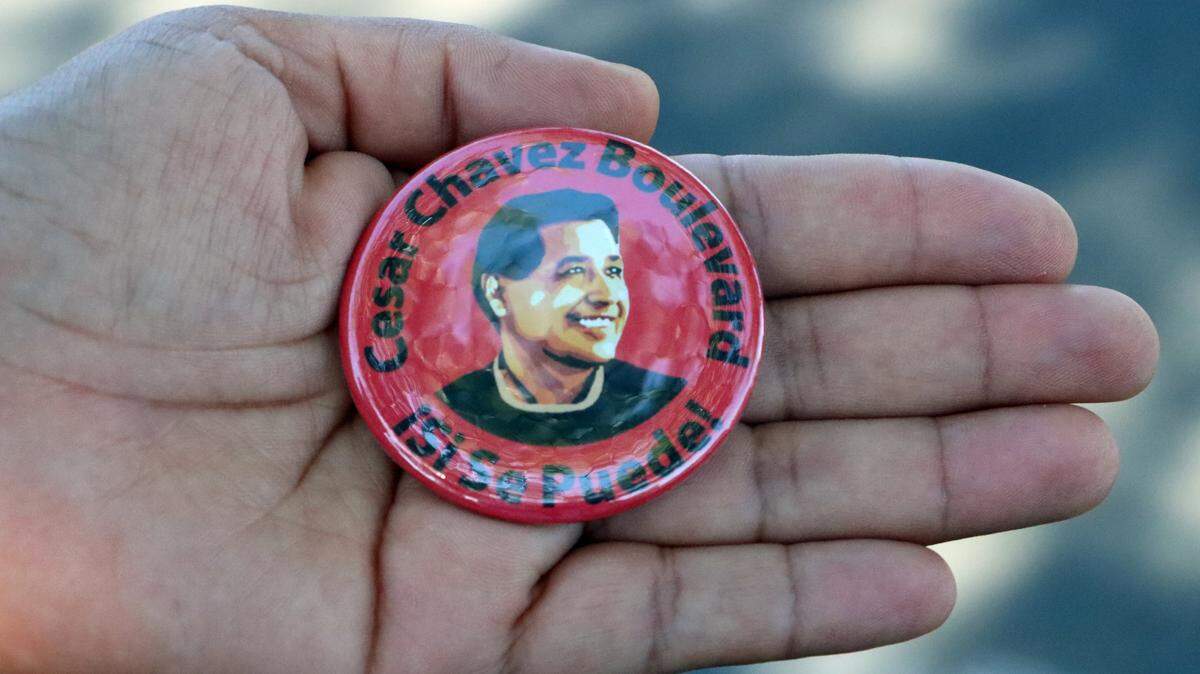 Participants at the July 26, 2024 celebration of Cesar Chavez Boulevard in southeast Fresno received a commemorative pin. A Fresno reader urges reverting Cesar Chavez Boulevard amid troubling allegations, arguing public street names should reflect community values and role models.