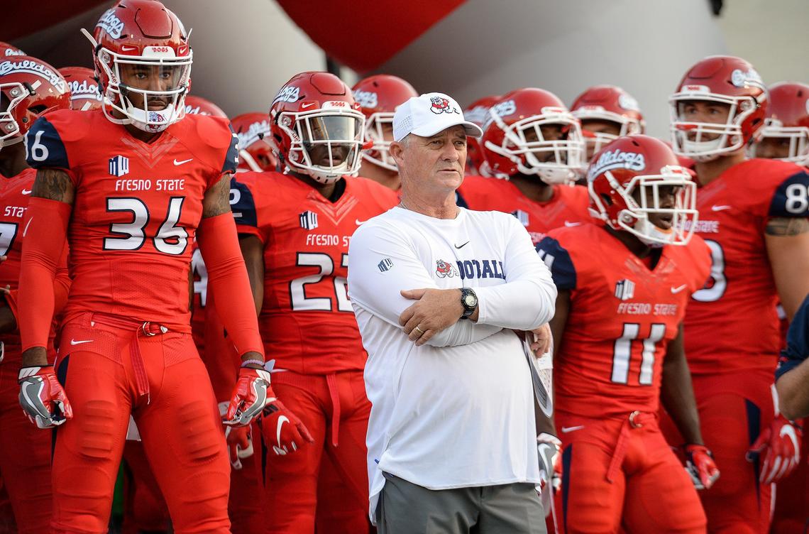Fresno State coach Jeff Tedford waits to lead the team onto the field before their game against Idaho at Bulldog Stadium on Saturday, Sept. 1, 2018.