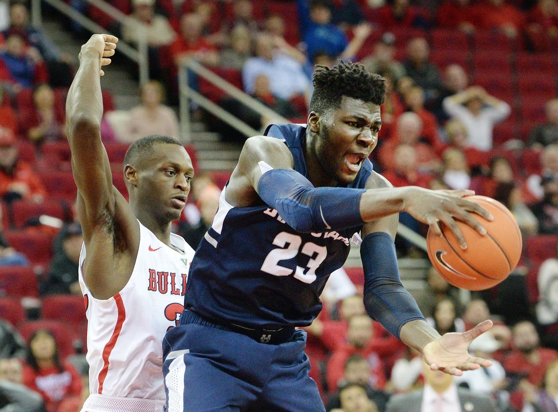 Fresno State’s Nate Grimes, left, watches a Utah State center Neemias Queta grabs a rebound during the Aggies’ 82-81 victory at the Save Mart Center in Fresno on Tuesday, Feb. 5, 2019. Queta, a 6-foot-11 freshman, scored 18 points and had 15 rebounds, six assists and four blocked shots.