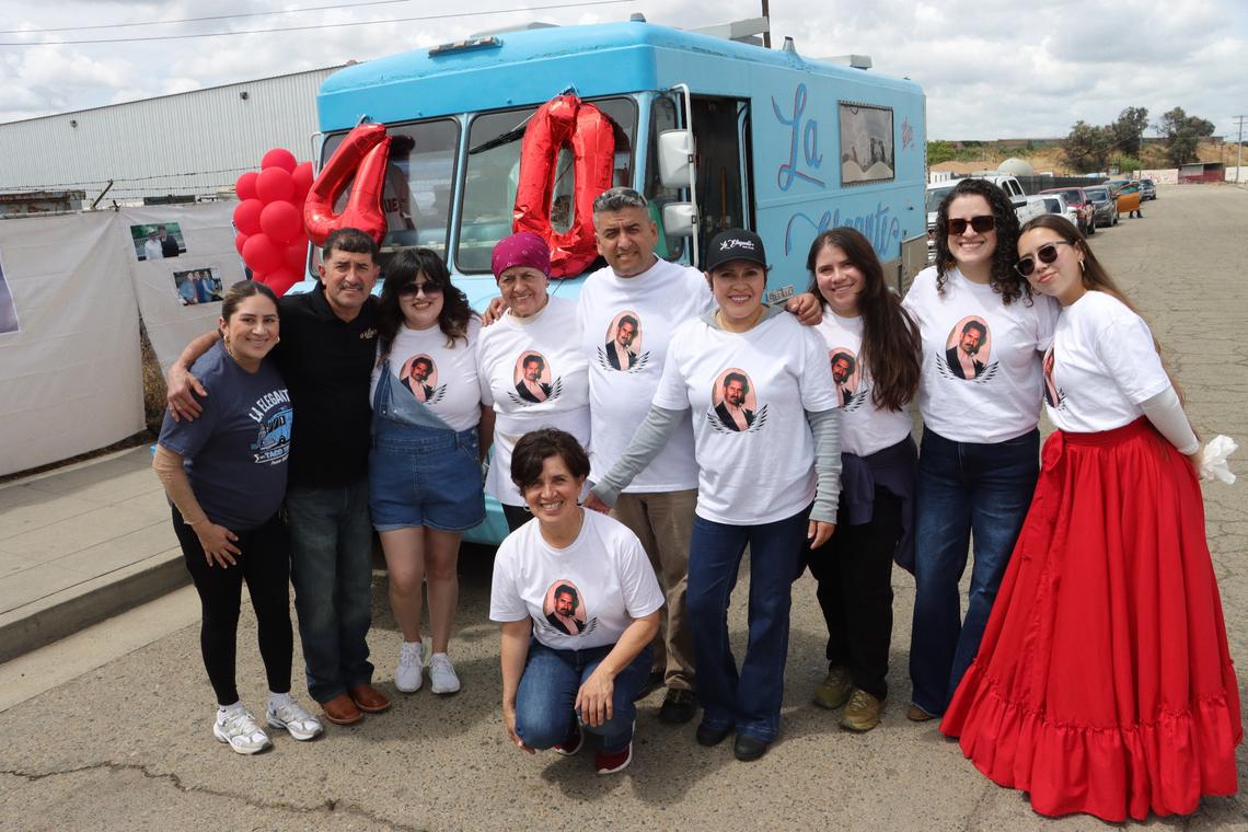 The Arenas family, left to right: Eliana Salas Arena, Abelardo Arenas, Andrena Arenas, Celia Arenas (the widow of Don Benito Arenas), Alejandra Arenas, Adolfo Arenas, Analia Arenas, Katia De La O Arenas, Aida Hinojosa Arenas and Azul Downs Arenas. The truck, a 1975 model, in the picture is the original truck that Benito Arenas started his taco truck business. The taco truck is open Thursday through Sunday from 10:30 a.m. to 1:30 p.m. at 2373-2399 E Muscat Ave, Fresno.