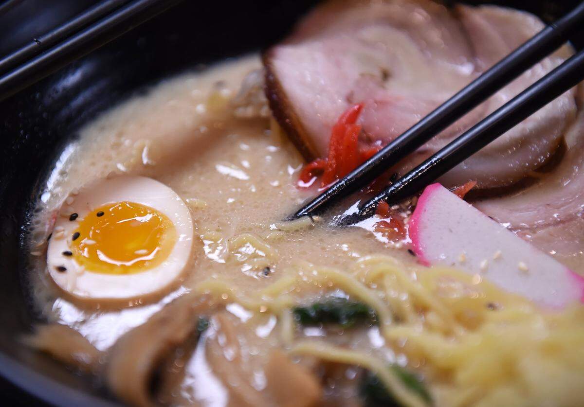 Shobu’s Tonkotsu Ramen has slices of roast pork, bean sprouts, spinach, shiitake mushrooms, fish cake, a soft-boiled egg in a creamy pork-based broth. Jerry Yang, who won the 2007 World Series of Poker, opened Shobu at Blackstone and Herndon avenues in 2020.