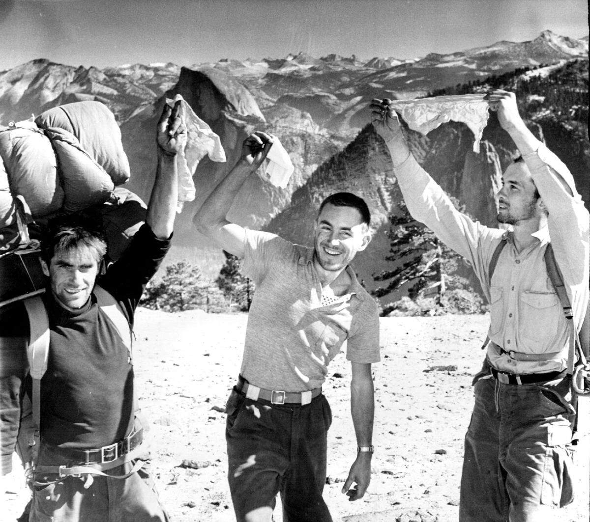 Warren Harding, Wayne Merry, and George Whitmore, left to right, on Nov. 12, 1958, a few minutes after becoming the first people to have climbed the sheer face of El Capitan in Yosemite National Park. Fresno Bee photographer Loyal Savaria was waiting for them on the summit to help share the joy.