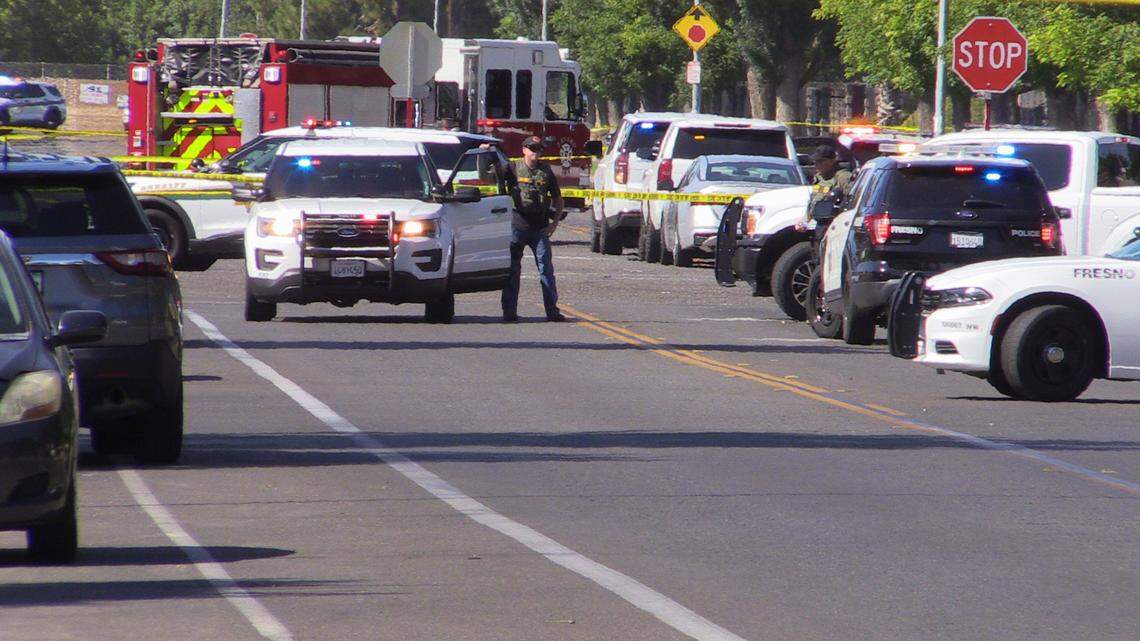 Authorities investigate a deputy involved shooting after a suspect opened fire at deputies at Valentine and San Jose avenues in Fresno, California on Thursday, Aug. 11, 2022.
