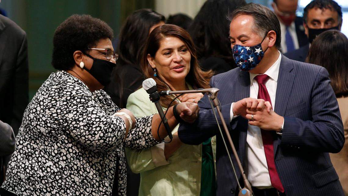  In this photo from June 10, Assemblywoman Shirley Weber, D-San Diego, left, receives congratulations from fellow Assembly members Sharon Quirk-Silva, D-Fullerton, center, and Phil Ting, D-San Francisco, after the Assembly approved her measure to place a constitutional amendment on the Nov. 3 ballot to let voters decide if the state should overturn its ban on affirmative action programs.