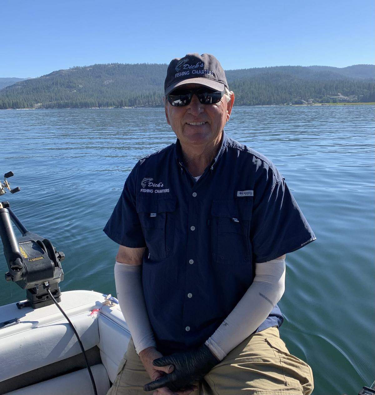 Dick Nichols in an undated photo on Shaver Lake. Nichols announced he’s retiring as a fishing guide in September.