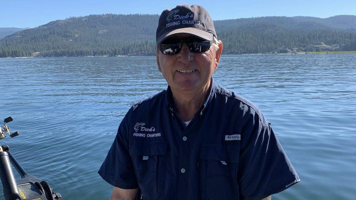 Dick Nichols in an undated photo on Shaver Lake. Nichols announced he’s retiring as a fishing guide in September.