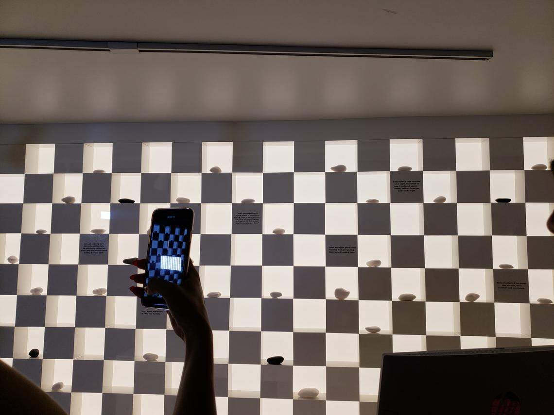 A woman captures on her phone the entrance to the William Saroyan House Museum on its grand opening, Friday, Aug. 31, 2018.