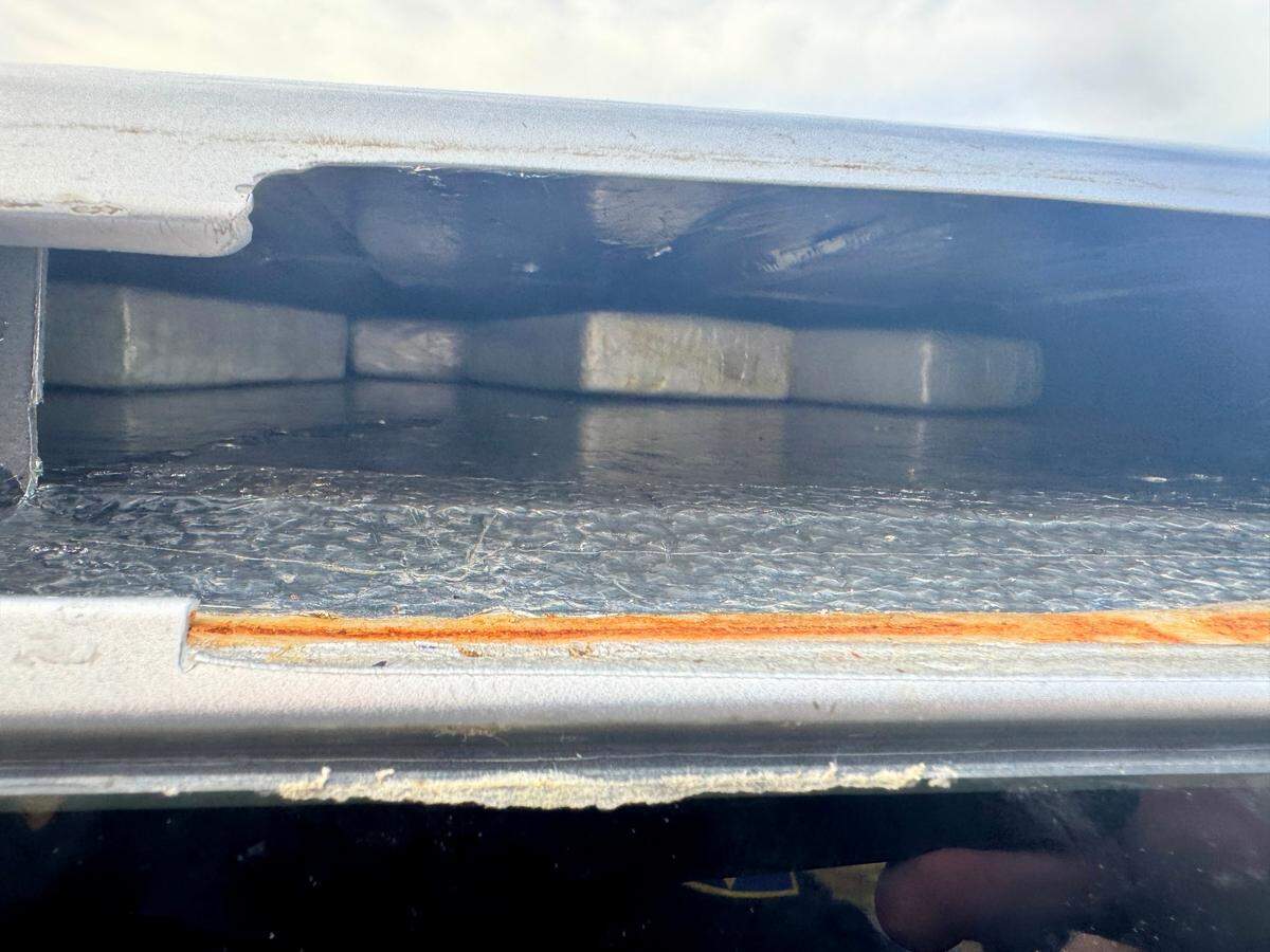 Cocaine was discovered in the compartment in the roof of the truck. The compartment contained about 20 pounds of suspected cocaine.