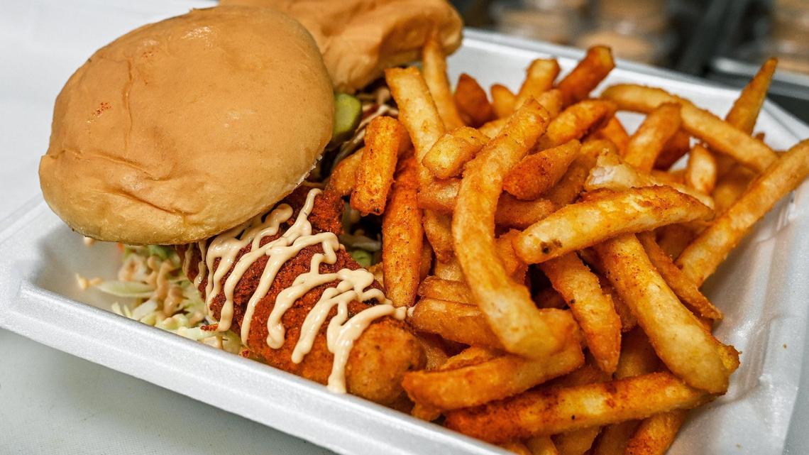 Two birdz with fries is two chicken tender sandwiches seasoned to order with seasoned fries from Spicy Birdz photographed in the space they share with The Curry Life Indian food and bubble Bee boba drinks in the Bluff View shopping center at Herndon and West in Fresno on Wednesday, Feb. 15, 2023.