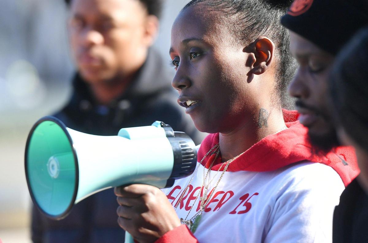 Regina Bell, mother to Rashad Al-Hakim Jr., the 15-year old Hoover High School student killed in a hit and run Oct. 4, 2022, speaks out to those gathered as a rally is held seeking justice outside the Fresno County Courthouse Monday morning, Jan. 23, 2023 in Fresno. The accused driver, Lisa Ellen Spoors, received reduced bail and left jail January 19.