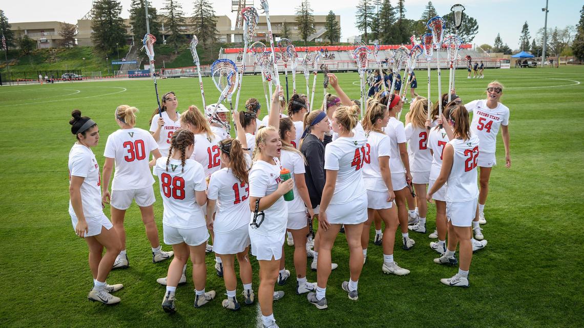 Members of the Fresno State women’s lacrosse team gather for a huddle during their game against Yale at Fresno State on Thursday, March 12, 2020. The game turned out to be the last of the season due to concerns over the spread of the novel coronavirus or COVID-19.